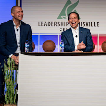 Louisville Mayor Craig Greenberg, center, shared a laugh with Louisville basketball coach Pat Kelsey and Kentucky basketball coach Mark Pope at the 2024 Leadership Louisville Luncheon at the Kentucky International Convention Center in downtown Louisville on Wednesday, August 28, 2024.