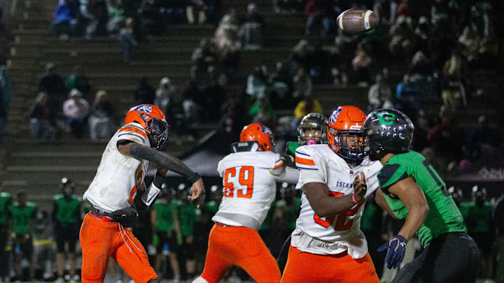 Quarterback Nino Freeman (2) passes during the Escambia vs Choctaw Region 1-4A semifinals football game at Choctaw High School in Fort Walton Beach on Friday, Nov. 22, 2024.