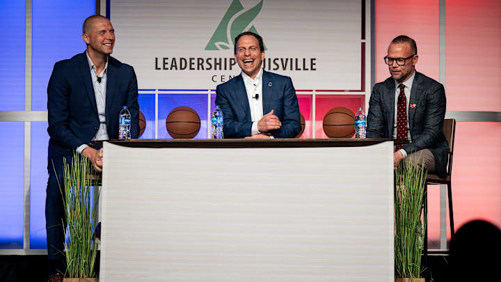 Louisville Mayor Craig Greenberg, center, shared a laugh with Louisville basketball coach Pat Kelsey and Kentucky basketball coach Mark Pope at the 2024 Leadership Louisville Luncheon at the Kentucky International Convention Center in downtown Louisville on Wednesday, August 28, 2024.