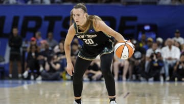 Jul 13, 2024; Chicago, Illinois, USA; New York Liberty guard Sabrina Ionescu (20) brings the ball up court against the Chicago Sky during the first half of a WNBA game at Wintrust Arena.