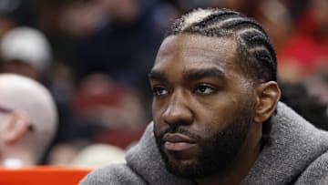 Dec 8, 2024; Chicago, Illinois, USA; Injured Chicago Bulls forward Patrick Williams sits on the bench during the first half of a basketball game against the Philadelphia 76ers at United Center. Mandatory Credit: Kamil Krzaczynski-Imagn Images