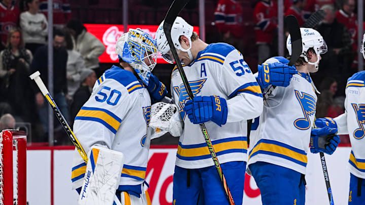 Dec 7, 2025; Montreal, Quebec, CAN; St. Louis Blues defenseman Colton Parayko (55) headbutts goalie Jordan Binnington (50) to celebrate the win against the Montreal Canadiens at Bell Centre. Mandatory Credit: David Kirouac-Imagn Images