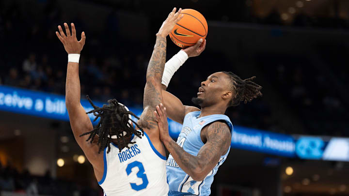 Memphis' Colby Rogers (3) tries to block North Carolina's Jae'Lyn Withers (24) during the game between UNC and Memphis in the Hoops for St. Jude Tip Off Classic at FedExForum on Tuesday, October 15, 2024.