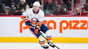 Dec 3, 2024; Montreal, Quebec, CAN; New York Islanders right wing Maxim Tsyplakov (7) plays the puck against the Montreal Canadiens during the first period at Bell Centre. Mandatory Credit: David Kirouac-Imagn Images