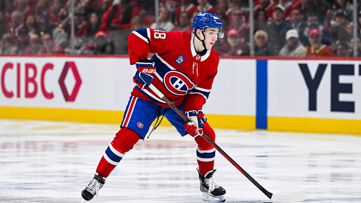 Apr 27, 2025; Montreal, Quebec, CAN; Montreal Canadiens defenseman Lane Hutson (48) considers his options with the puck against the Washington Capitals during the third period in game four of the first round of the 2025 Stanley Cup Playoffs at Bell Centre. Mandatory Credit: David Kirouac-Imagn Images Apr 27, 2025; Montreal, Quebec, CAN; Montreal Canadiens defenseman Lane Hutson (48) considers his options with the puck against the Washington Capitals during the third period in game four of the first round of the 2025 Stanley Cup Playoffs at Bell Centre. Mandatory Credit: David Kirouac-Imagn Images