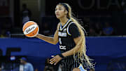 Jul 12, 2025; Chicago, Illinois, USA; Chicago Sky forward Angel Reese (5) controls the ball against the Minnesota Lynx during the second half of a WNBA game at Wintrust Arena. Mandatory Credit: Kamil Krzaczynski-Imagn Images