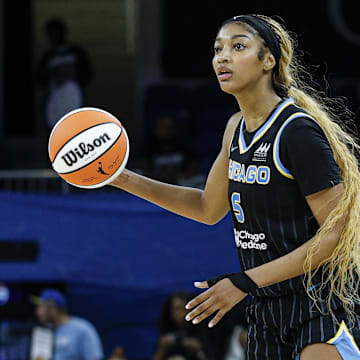 Jul 12, 2025; Chicago, Illinois, USA; Chicago Sky forward Angel Reese (5) controls the ball against the Minnesota Lynx during the second half of a WNBA game at Wintrust Arena. Mandatory Credit: Kamil Krzaczynski-Imagn Images