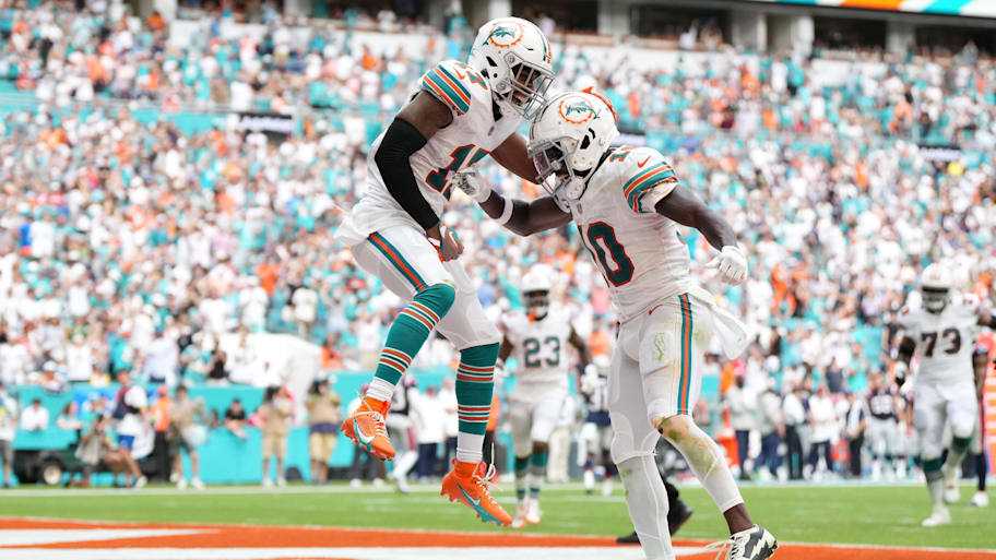 Miami Dolphins wide receiver Jaylen Waddle (17) celebrates his touchdown against the New England Patriots with wide receiver Tyreek Hill (10) during the second half at Hard Rock Stadium in 2023. | Jasen Vinlove-Imagn Images