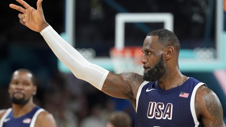 Jul 28, 2024; Villeneuve-d'Ascq, France; United States guard Lebron James (6) reacts after a play in the third quarter against Serbia during the Paris 2024 Olympic Summer Games at Stade Pierre-Mauroy. Mandatory Credit: John David Mercer-USA TODAY Sports