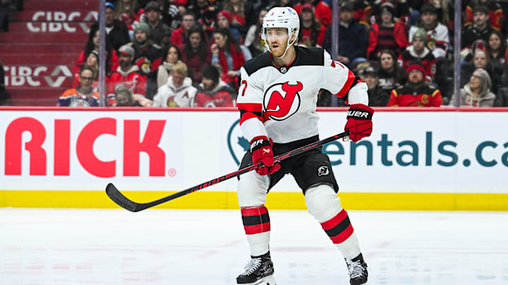 Jan 31, 2026; Ottawa, Ontario, CAN; New Jersey Devils defenseman Dougie Hamilton (7) tracks the play against the Ottawa Senators during the first period at Canadian Tire Centre.