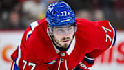 Feb 8, 2025; Montreal, Quebec, CAN; Montreal Canadiens center Kirby Dach (77) waits for a face-off against the New Jersey Devils during the second period at Bell Centre. Mandatory Credit: David Kirouac-Imagn Images