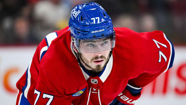 Feb 8, 2025; Montreal, Quebec, CAN; Montreal Canadiens center Kirby Dach (77) waits for a face-off against the New Jersey Devils during the second period at Bell Centre. Mandatory Credit: David Kirouac-Imagn Images