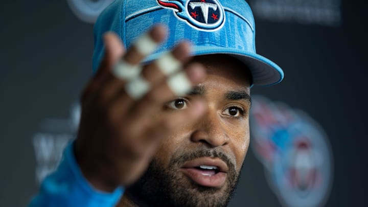 Tennessee Titans safety Jamal Adams (33) fields questions from the media on the first day of training camp at Ascension Saint Thomas Sports Park Wednesday, July 24, 2024.