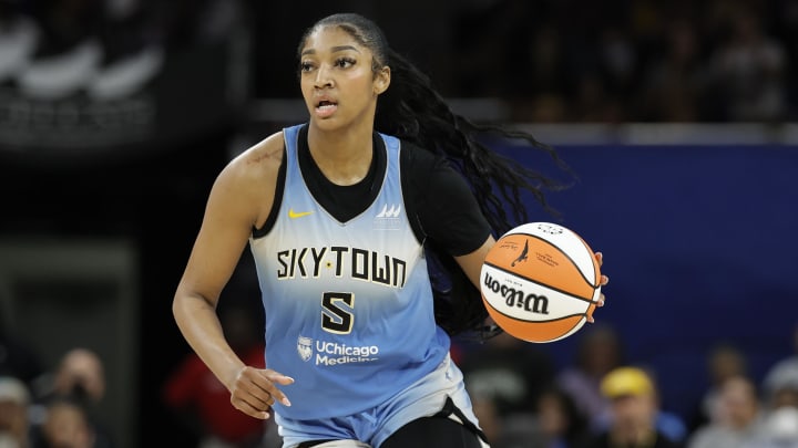 Jul 13, 2024; Chicago, Illinois, USA; Chicago Sky forward Angel Reese (5) brings the ball up court against the New York Liberty during the second half of a WNBA game at Wintrust Arena. Mandatory Credit: Kamil Krzaczynski-USA TODAY Sports