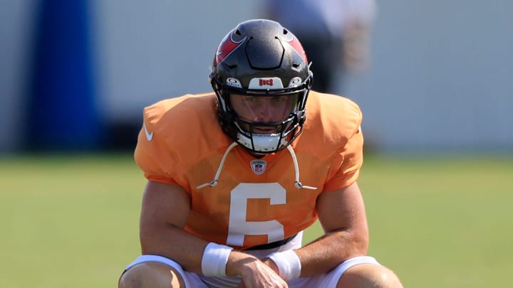 Tampa Bay Buccaneers quarterback Baker Mayfield (6) rests during a combined NFL football training camp session between the Tampa Bay Buccaneers and Jacksonville Jaguars Wednesday, Aug. 14, 2024 at EverBank Stadium’s Miller Electric Center in Jacksonville, Fla. [Corey Perrine/Florida Times-Union]