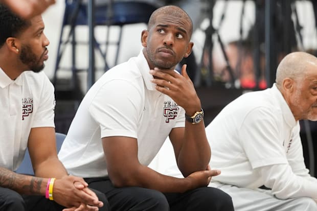 NBA player Chris Paul looks on as Team CP3