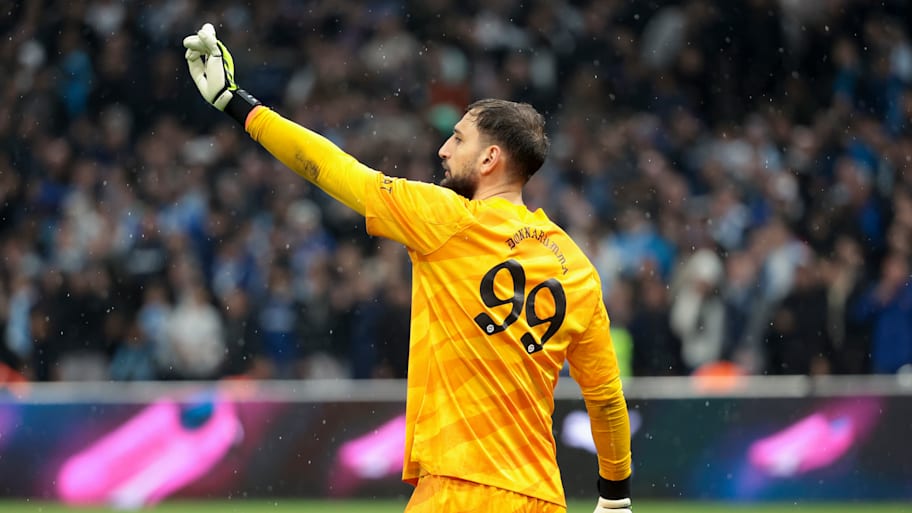 Gianluigi Donnarumma wearing No. 99 shirt.