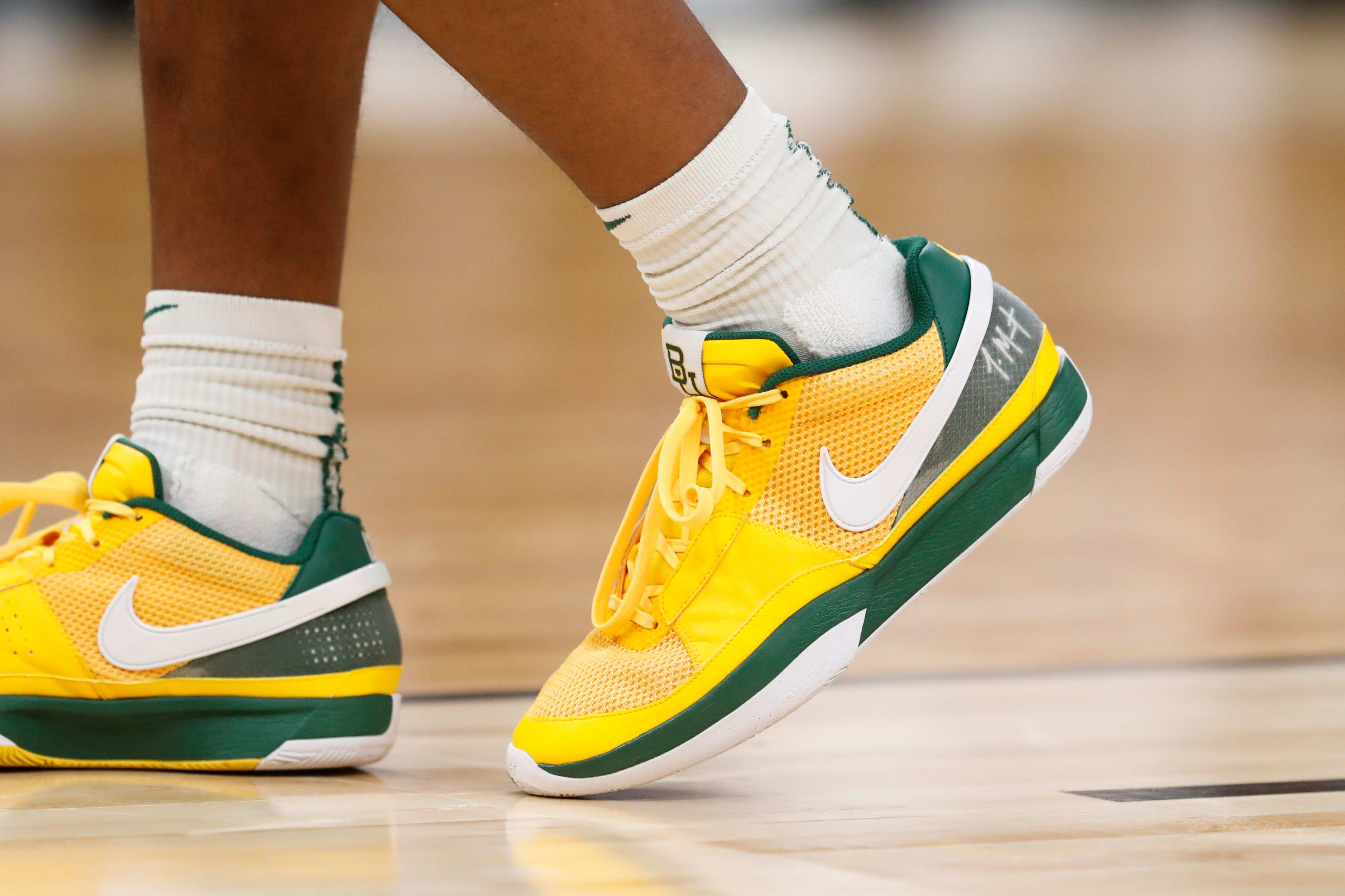 Baylor Bears guard Ja'Kobe Walter's yellow and green Nike sneakers.
