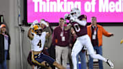 Oct 24, 2025; Blacksburg, Va.; Virginia Tech wide receiver Ayden Greene (0) catches a pass for a touchdown.