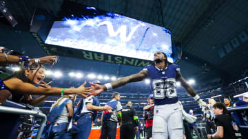 Dec 30, 2023; Arlington, Texas, USA;  Dallas Cowboys wide receiver CeeDee Lamb (88) celebrates with fans after the game against the Detroit Lions at AT&T Stadium. Mandatory Credit: Kevin Jairaj-USA TODAY Sports
