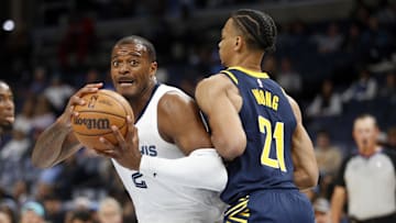 Oct 8, 2023; Memphis, Tennessee, USA; Memphis Grizzlies forward Xavier Tillman (2) drives toward the basket as Indiana Pacers guard Isaiah Wong (21) defends during the second half at FedExForum. Mandatory Credit: Petre Thomas-Imagn Images