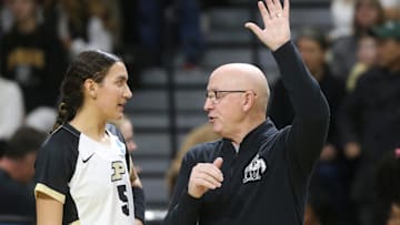 Purdue Boilermakers setter Taylor Anderson (5) talks to head coach Dave Shondell 