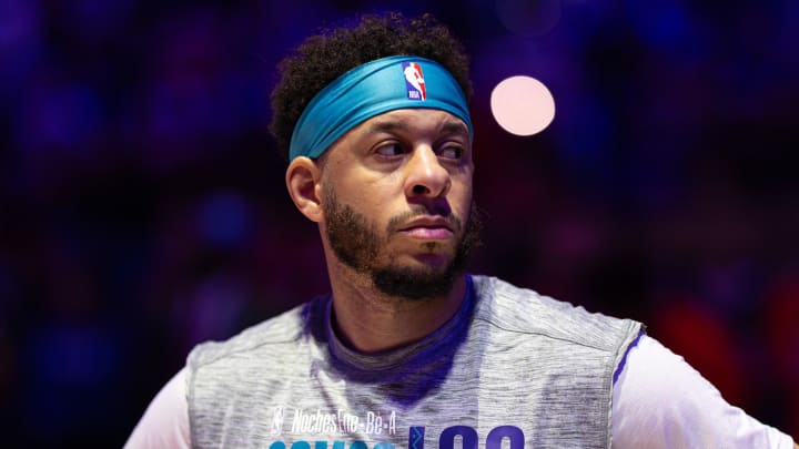 Mar 1, 2024; Philadelphia, Pennsylvania, USA; Charlotte Hornets guard Seth Curry stands for the anthem before action against the Philadelphia 76ers at Wells Fargo Center. Mandatory Credit: Bill Streicher-USA TODAY Sports