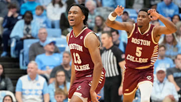 Jan 25, 2025; Chapel Hill, North Carolina, USA;  Boston College Eagles guard Donald Hand Jr. (13) reacts with guard Fred Payne (5) after scoring in the second half at Dean E. Smith Center. Mandatory Credit: Bob Donnan-Imagn Images