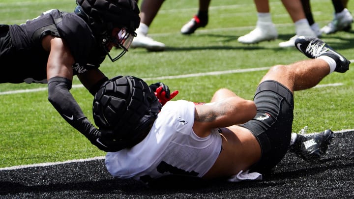 Cincinnati Bearcats tight end Joe Royer (11) scores a touchdown during a scrimmage, Saturday, Aug. 10, 2024, at Nippert Stadium in Cincinnati.