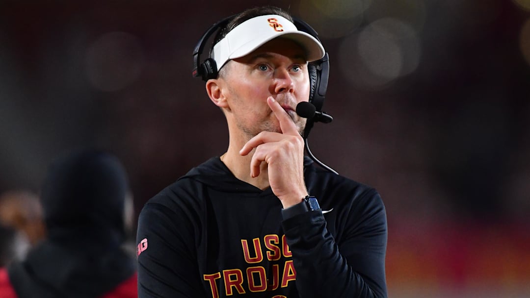 Nov 7, 2025; Los Angeles, California, USA; Southern California Trojans head coach Lincoln Riley watches game action against the Northwestern Wildcats during the second half at the Los Angeles Memorial Coliseum. Mandatory Credit: Gary A. Vasquez-Imagn Images Nov 7, 2025; Los Angeles, California, USA; Southern California Trojans head coach Lincoln Riley watches game action against the Northwestern Wildcats during the second half at the Los Angeles Memorial Coliseum. Mandatory Credit: Gary A. Vasquez-Imagn Images