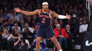 Mar 12, 2024; New York, New York, USA; New York Knicks guard Miles McBride (2) reacts after a basket against the Philadelphia 76ers during the second half at Madison Square Garden. Mandatory Credit: Vincent Carchietta-USA TODAY Sports