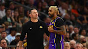 Oct 28, 2024; Phoenix, Arizona, USA; Los Angeles Lakers head coach JJ Redick with guard D'Angelo Russell (1) against the Phoenix Suns at Footprint Center. Mandatory Credit: Mark J. Rebilas-Imagn Images