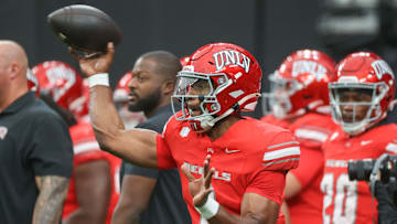 Hajj-Malik Williams #6 of the UNLV Rebels warms up prior to a game against the Fresno State Bulldogs at Allegiant Stadium on September 28, 2024 in Las Vegas, Nevada.