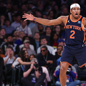 Mar 12, 2024; New York, New York, USA; New York Knicks guard Miles McBride (2) reacts after a basket against the Philadelphia 76ers during the second half at Madison Square Garden. Mandatory Credit: Vincent Carchietta-Imagn Images