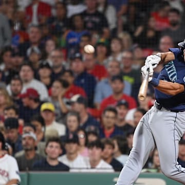 Seattle Mariners first baseman Jason Vosler (35) hits a single against the Boston Red Sox during the fifth inning at Fenway Park on July 29.