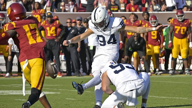 Penn State Nittany Lions kicker Ryan Barker hits the game-winning field goal in overtime against the USC Trojans.