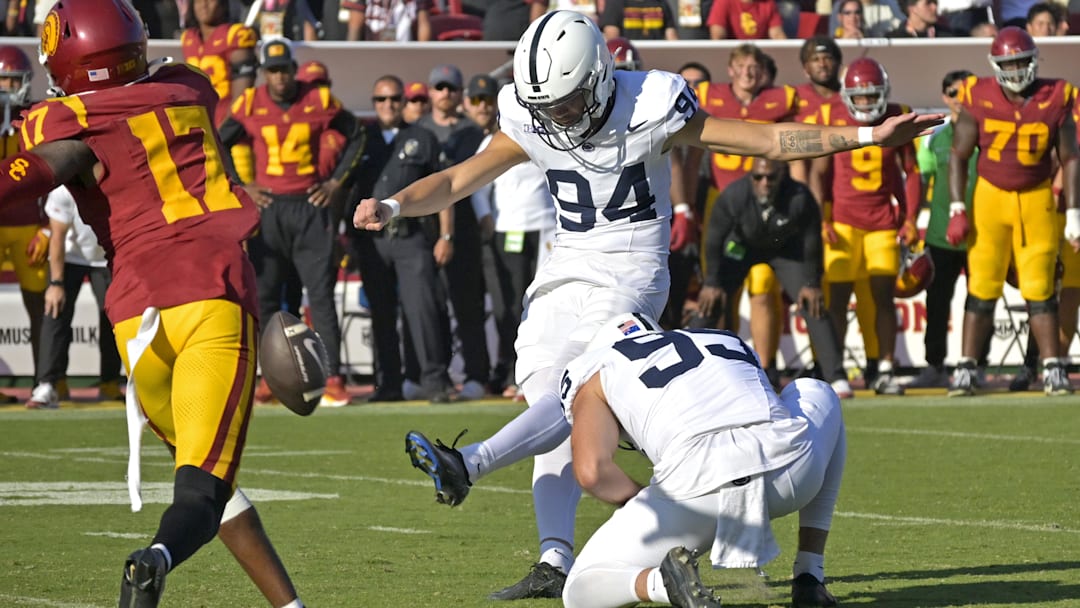 Penn State Nittany Lions kicker Ryan Barker (94) hits a field goal in overtime to defeat the USC Trojans at the Los Angeles Memorial Coliseum. 