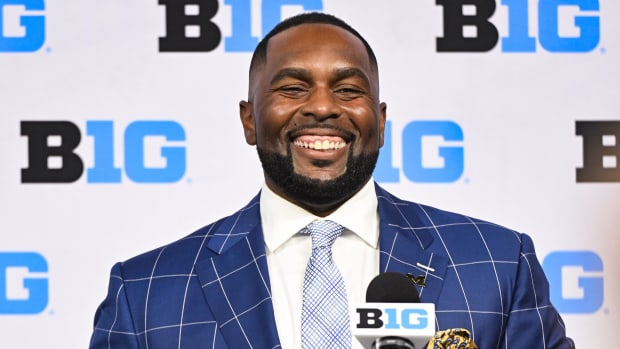 Michigan Wolverines head coach Sherrone Moore speaks to the media during the Big 10 football media day at Lucas Oil Stadium.