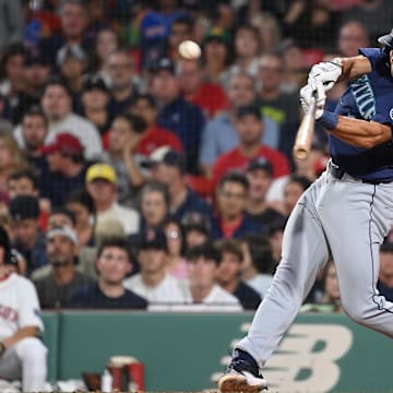 Seattle Mariners first baseman Jason Vosler hits a single during a game against the Boston Red Sox on July 29 at Fenway Park.