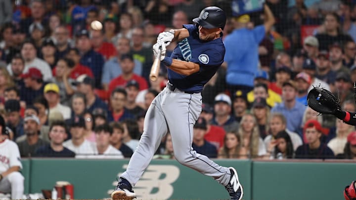 Seattle Mariners first baseman Jason Vosler hits a single during a game against the Boston Red Sox on July 29 at Fenway Park.