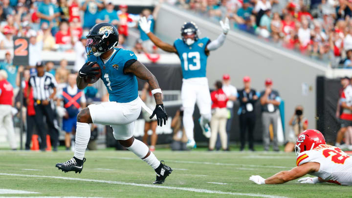 Aug 10, 2024; Jacksonville, Florida, USA; Jacksonville Jaguars running back Travis Etienne Jr. (1) runs the ball in for a touchdown during the first quarter against the Kansas City Chiefs at EverBank Stadium. Mandatory Credit: Douglas DeFelice-USA TODAY Sports