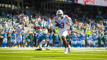 Sep 9, 2023; New Orleans, Louisiana, USA;   Mississippi Rebels wide receiver Tre Harris (9) catches a pass for a touchdown against the Tulane Green Wave during the first half at Yulman Stadium. Mandatory Credit: Stephen Lew-USA TODAY Sports