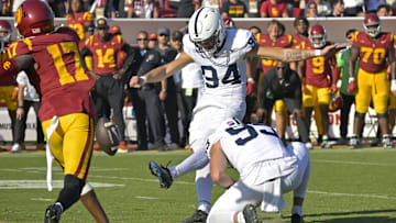 Oct 12, 2024; Los Angeles, California, USA; USC Penn State Nittany Lions place kicker Ryan Barker (94) hits a field goal in overtime to defeat the USC Trojans at United Airlines Field at the Los Angeles Memorial Coliseum. Mandatory Credit: Jayne Kamin-Oncea-Imagn Images