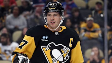 Oct 9, 2024; Pittsburgh, Pennsylvania, USA;  Pittsburgh Penguins center Sidney Crosby (87) looks on against the New York Rangers during the third period at PPG Paints Arena. Mandatory Credit: Charles LeClaire-Imagn Images