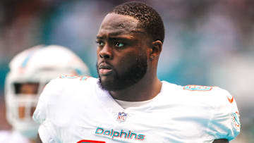 Sep 19, 2021; Miami Gardens, Florida, USA; Miami Dolphins offensive guard Robert Jones (65) looks on from the sideline during the second quarter of the game against the Buffalo Bills at Hard Rock Stadium. Mandatory Credit: Sam Navarro-Imagn Images