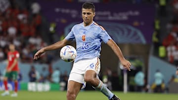 Dec 6, 2022; Ar Rayyan, QATAR; Spain midfielder Rodri (16) controls the ball against Morocco during the second half in the round of sixteen match of the 2022 FIFA World Cup at Education City Stadium. Mandatory Credit: Yukihito Taguchi-Imagn Images