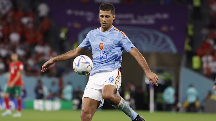 Dec 6, 2022; Ar Rayyan, QATAR; Spain midfielder Rodri (16) controls the ball against Morocco during the second half in the round of sixteen match of the 2022 FIFA World Cup at Education City Stadium. Mandatory Credit: Yukihito Taguchi-Imagn Images