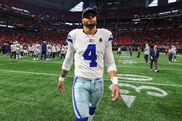 Dallas Cowboys QB Dak Prescott walks off the field after a game against the Atlanta Falcons Dallas Cowboys QB Dak Prescott walks off the field after a game against the Atlanta Falcons
