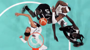 Jul 31, 2024; Villeneuve-d'Ascq, France; United States guard Tyrese Haliburton (9) and center Bam Adebayo (13) fight for position with South Sudan small forward Nuni Omot (5) and power forward Wenyen Gabriel (9) in the second quarter during the Paris 2024 Olympic Summer Games at Stade Pierre-Mauroy. Mandatory Credit: John David Mercer-USA TODAY Sports