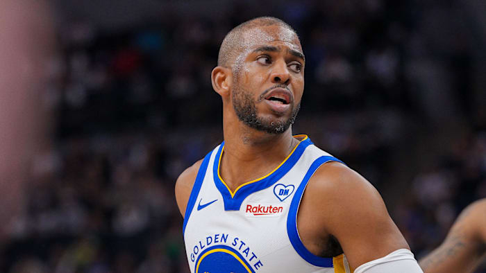 Mar 24, 2024; Minneapolis, Minnesota, USA; Golden State Warriors guard Chris Paul (3) dribbles